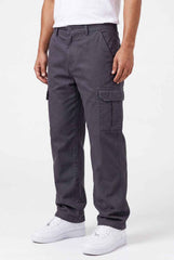 Person wearing gray cargo pants on a white background